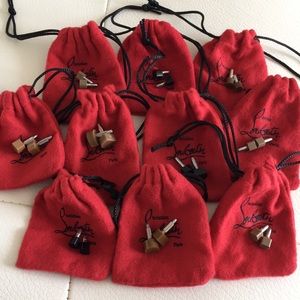Authentic Christian Louboutin pouches with tips